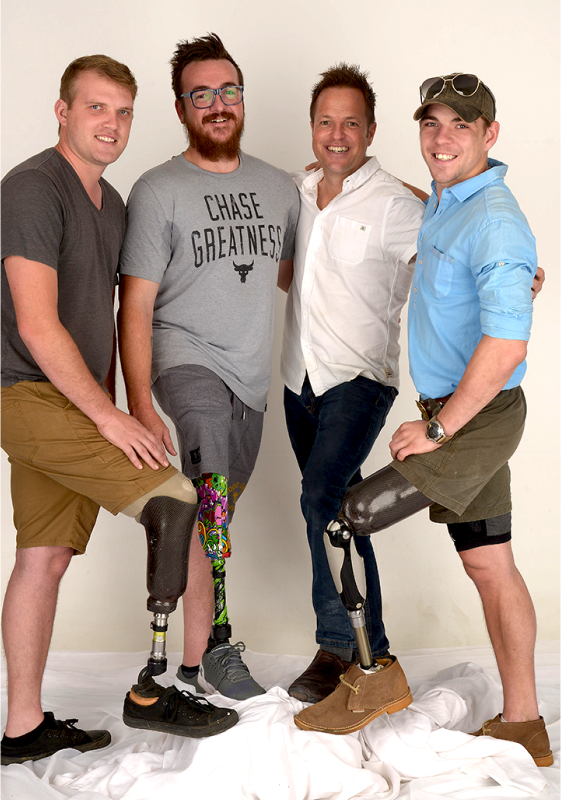 Jaco Deist with three amputee patients